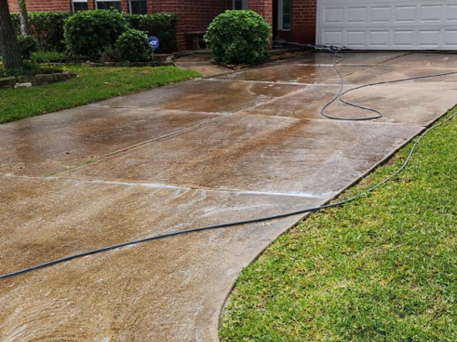 Driveway pressure washed, before